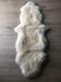 Håndsyet Lammeskindstæppe Hvid - 180 x 70 cm